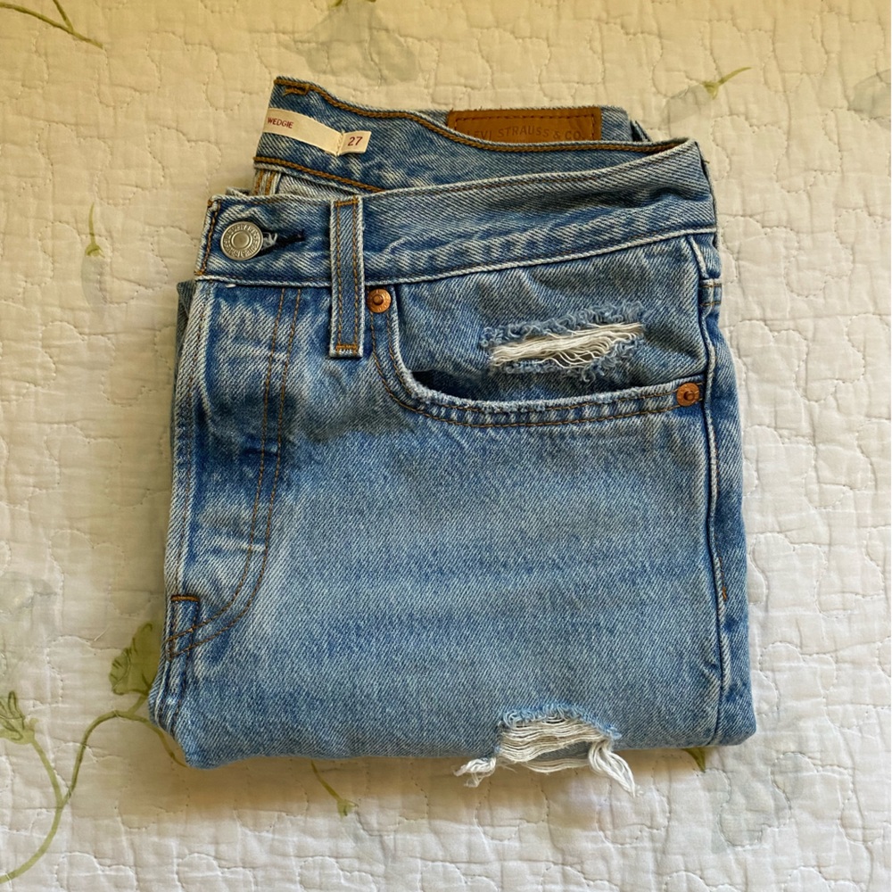 Distressed Levi Wedgie Jeans.